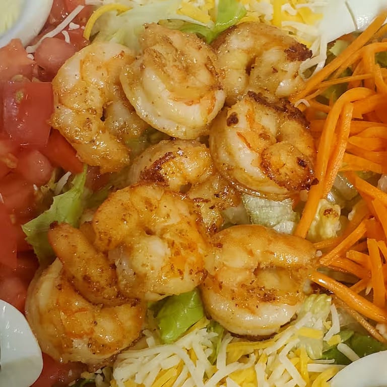 Indulge in our Signature Grilled Shrimp Salad